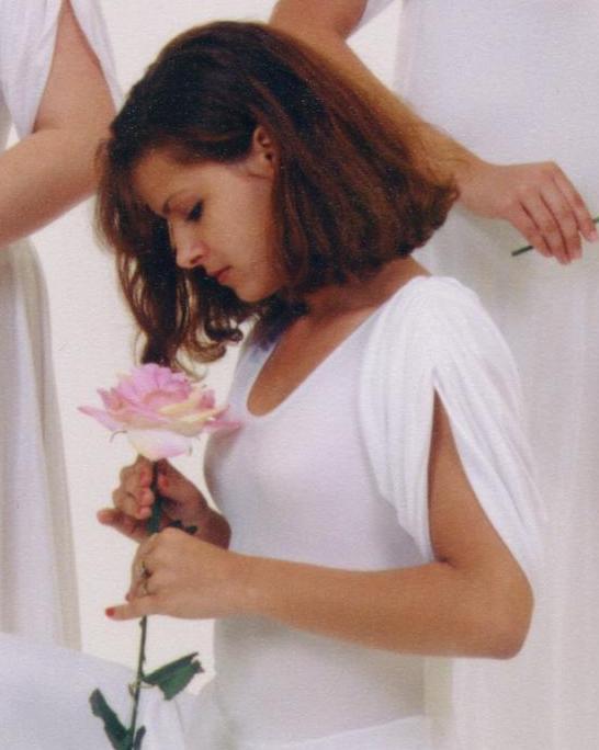 Woman in pink; Actual size=130 pixels wide